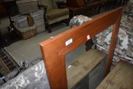 A modern pine wall mirror, approx. 92 x 67cm