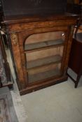 A Victorian walnut pier cabinet having ormolu mounts and satinwood inlay