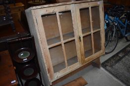 A stripped pine glazed dresser top