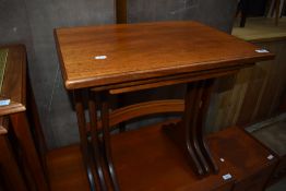 A vintage teak nest of three tables, badged G plan