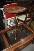 An early 20th Century mahogany wine table