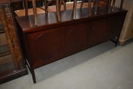 A Nathan sideboard, dark stained, in the 'circles' design, width approx. 183cm