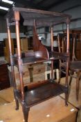 A Georgian style three tier etage having divider to middle section, on turned frame