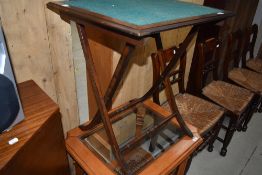 An early to mid 20th Century mahogany fold up card table on turned frame, approx. 61 x 50cm