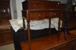 A reproduction mahogany ladies writing desk in the Regency style