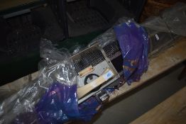A traditional knitting machine, labelled Knitmaster