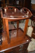 A modern hardwood butlers style occasional table