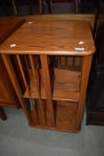 An Elm Ercol style revolving bookcase