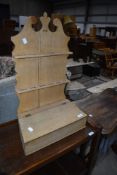 A stripped pine spoon rack, having lift flap lower box section, max width approx. 41cm