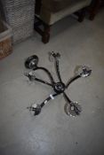 A chrome and glass ceiling light