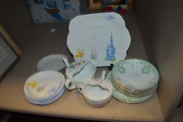 A selection of ceramics including floral Grafton cake plate and saucers.