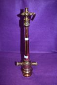 A vintage fire fighters copper and brass hose fitment