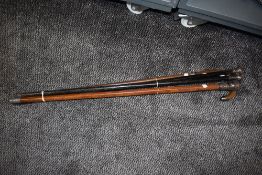 A selection of Victorian walking sticks and canes etc including HM silver topped