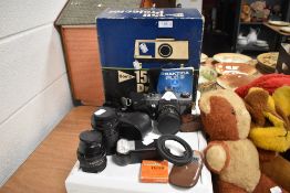 A Praktika 150 projector, Praktika camera, lenses and more.