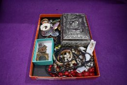 A selection of costume jewellery including plated chains, brooches, hematite beads etc