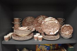 A part tea and dinner service by Broadhurst Ironstone in a town and village design