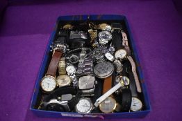 An assorted selection of mens fashion wrist watches including Tissot and Titan etc