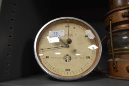 A vintage clock work Pye stop clock or similar.