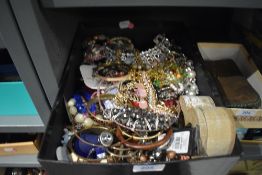 A box of assorted costume jewellery including bangles, bracelets etc