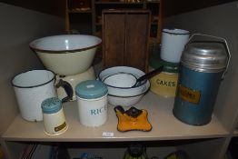 A large assortment of vintage enamel and kitchenalia including a rather large Thermos flask,