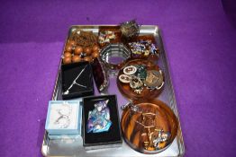 A mixed lot of jewellery and similar including beads, badges, bracelet and brooches.