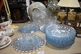 A selection of blue pressed glass serving dishes and bowls etc including tea cups