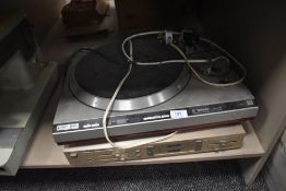 A Technic quartz turn table and Marantz amp.