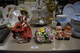 A Beswick Laurel and hardy salt and pepper set, a Royal Doulton 'Top o the hill' figurine and