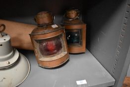 Two vintage copper ships or ship style lamps, one with green glass stating 'Starboard' the other