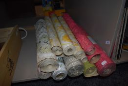 A bright collection of part rolls and five unopened rolls of vintage wallpaper,1960s and 1970s.