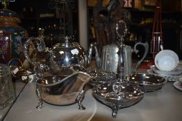 A selection of plated wares including gravy boat, teapot, baby rattle and condiment dish and pewter