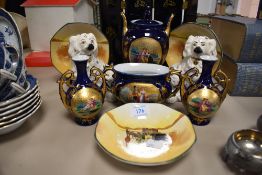 A mixed lot of items including Royal Doulton Staffordshire style dogs, Doulton series ware and