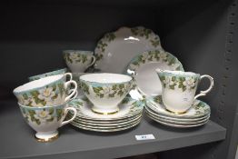 A collection of vintage Montrose Gladstone having orange blossom and green braid effect banding with
