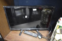 A modern Seiki 24inch television set with remote