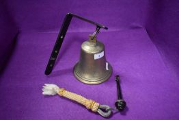 A last orders pub or tavern bell having been removed from the Liskeard Liberal club Cornwall