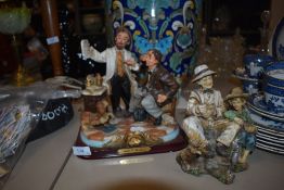 Two figure model base studies one titled Arte & Mestieri