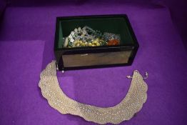 A selection of costume jewellery including glass beads and simulated pearls in hand decorated box