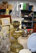 An early 20th century brass oil lamp.