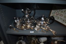 A lot containing plated ware and more, including cutlery, sugar basin, teapot, tray and more.