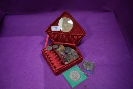 A selection of collectable coins and currency