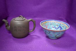 A hard paste Chinese rice bowl in a Cantonese design bearing signature mark to base and a similar