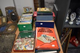 A selection of collectable stamps and postcards