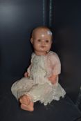 A mid century composite doll having HW 6A Foreign marked to back.