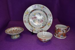 A selection of hard paste ceramics including a Japanese plate and incense stand with decorative
