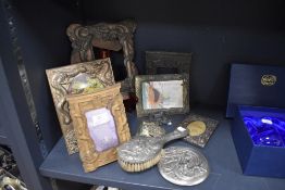 A mixed lot of Early 20th to century Japanese/Chinese photo frames, embossed dressing table set
