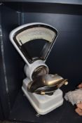 A set of vintage weighing scales.