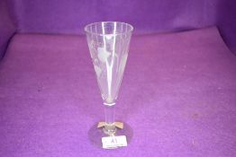 An ale glass on a plain foot decorated bowl with barley and hops