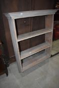 A stripped wall shelf, width approx. 80cm