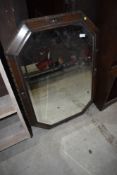 A large oak canted wall mirror