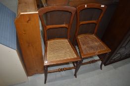 A pair of Victorian cane seated bedroom chairs